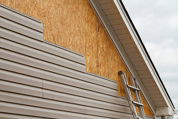 Professional Emergency Siding Repair technician working in Wayzata, MN